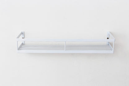 Prateleira branca de parede com design moderno e minimalista para organização